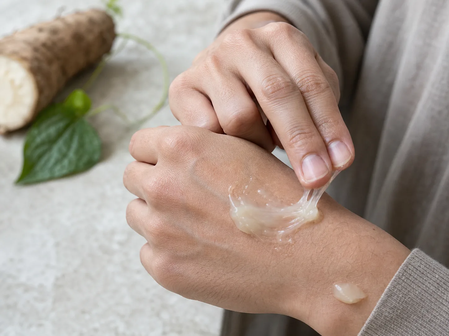 Dioscorea Japonica Root Extract product texture being applied to skin